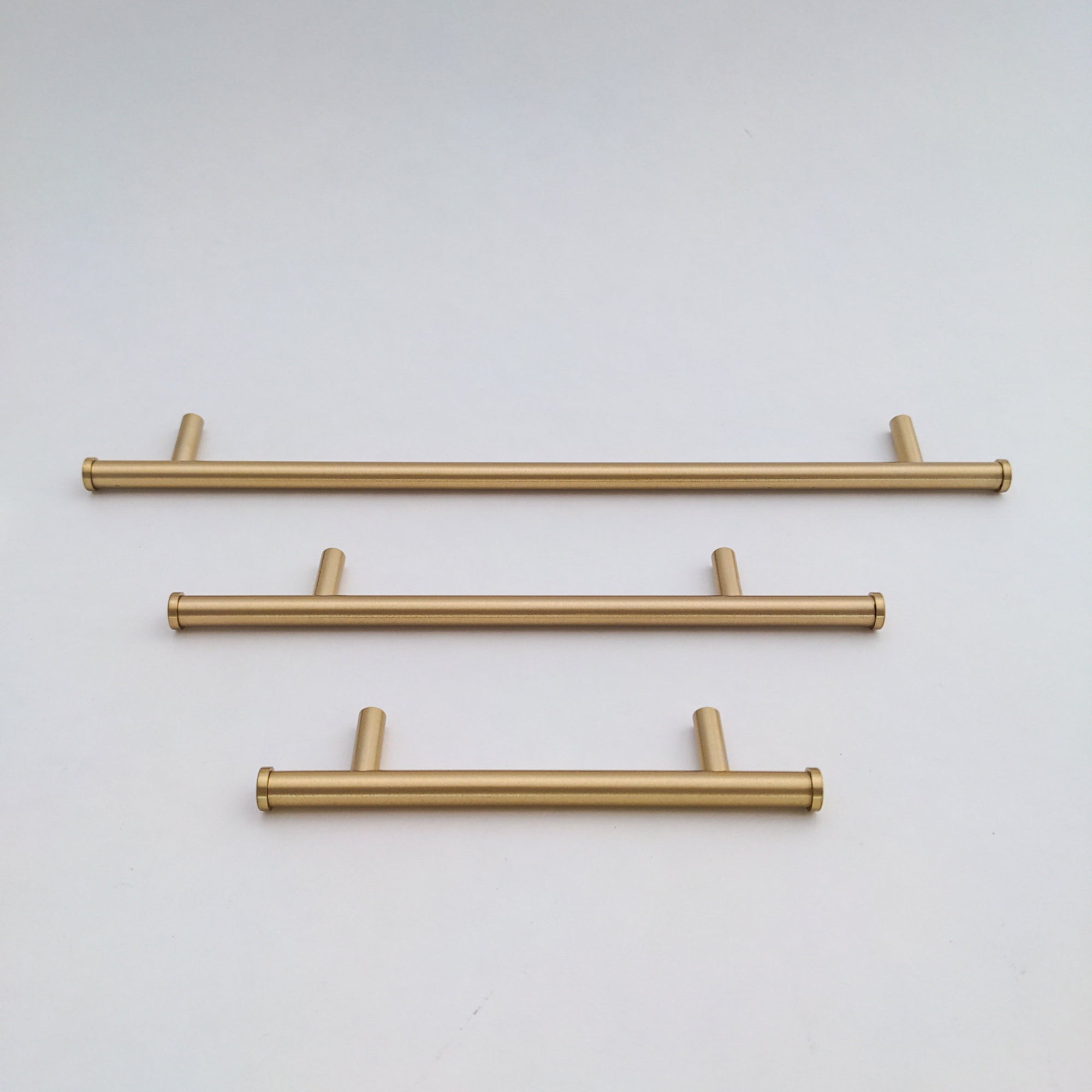 Satin Gold Flared End Handles - Hooks & Knobs Satin Gold Flared End Handles - Hooks & Knobs